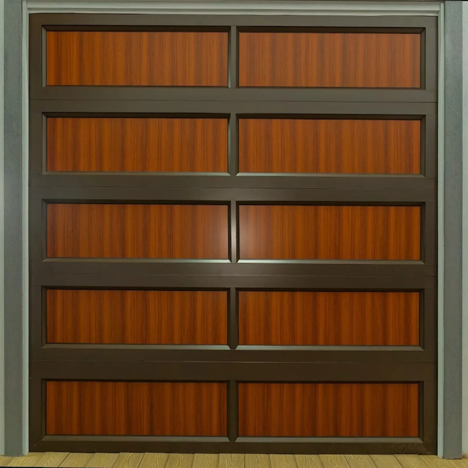 Modern dark aluminium garage door frame with rustic wood-look panels.
